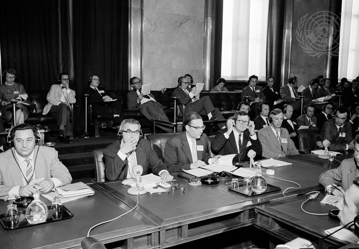 Black and white photograph of scientific conference meeting